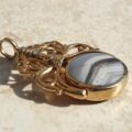 Ornate Double Sided Agate and Onyx Spinner Fob in 9ct Gold.