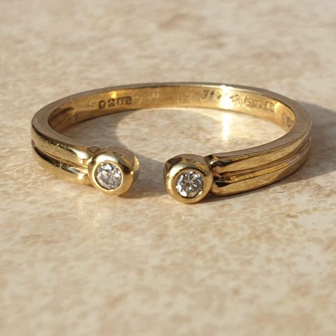 Diamond Set Torque Ring in 9ct Gold,  a UK M 1/2 or a US 6 3/4.