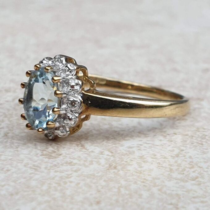 Aquamarine and Diamond Cluster Ring in 9ct Gold,  a UK M 1/2 or a US 6 3/4.