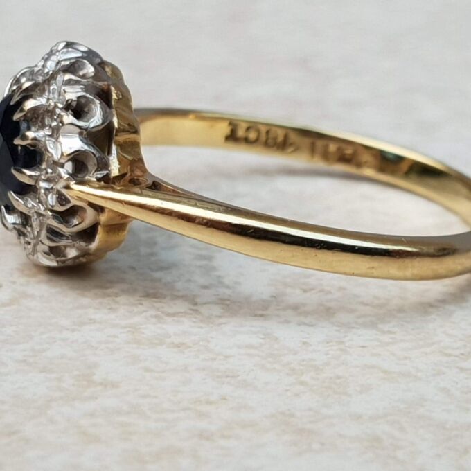 Sapphire and Diamond Halo ring in 18ct Gold and Platinum, a UK M or a US 6 1/2.