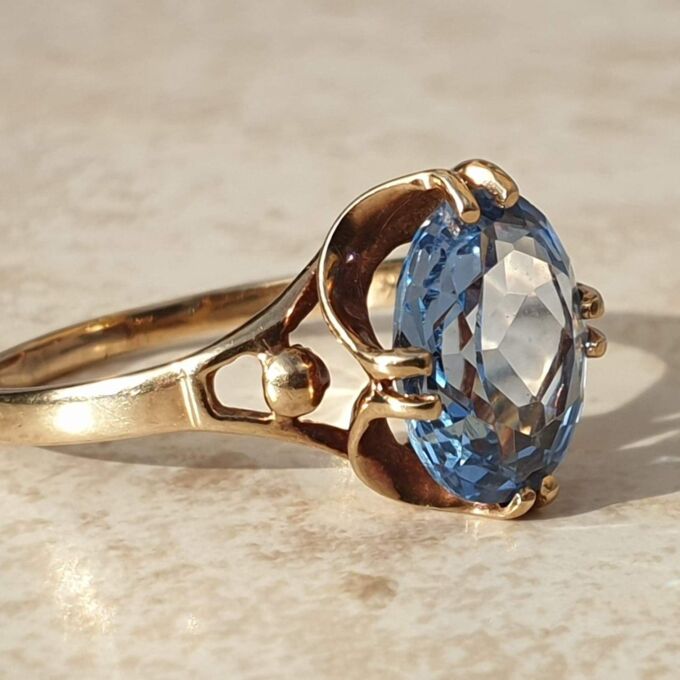 Synthetic Spinel Solitaire Ring in 9ct gold,  a UK L 1/2-M or a US 6 1/2.