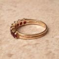 Seven Stone Garnet Band in 9ct Gold, a UK L 1/2 or a US 6