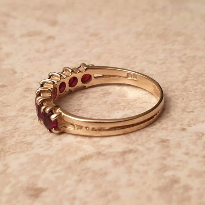 Seven Stone Garnet Band in 9ct Gold, a UK L 1/2 or a US 6