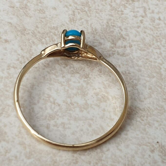 Turquoise Coloured Cabochon in 9ct Gold,  a UK O or a US 7 1/2.