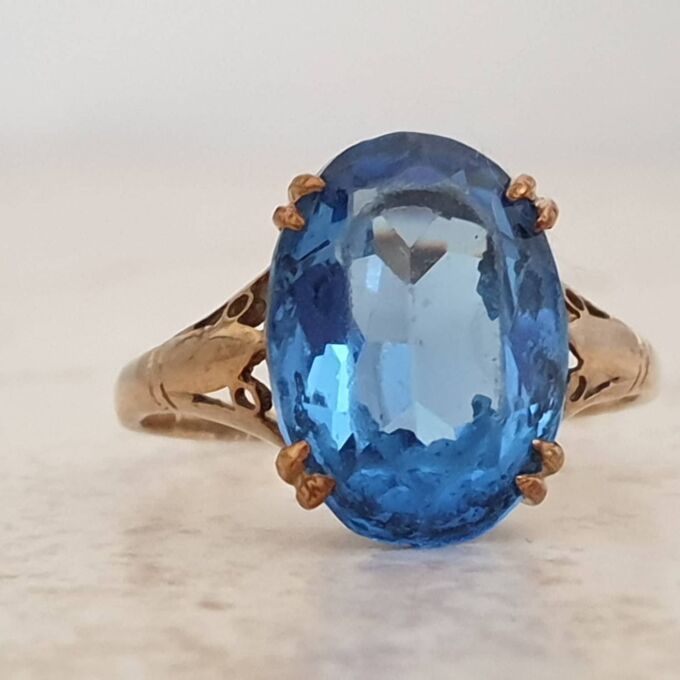 Eye-catching Blue Paste Solitaire in 9ct Gold, a UK P 1/2 or a US 8 1/4.