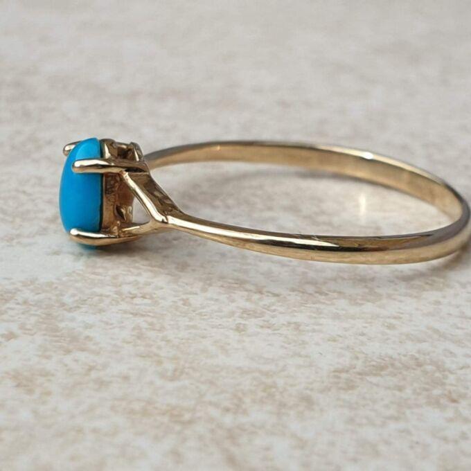 Turquoise Coloured Cabochon in 9ct Gold,  a UK O or a US 7 1/2.