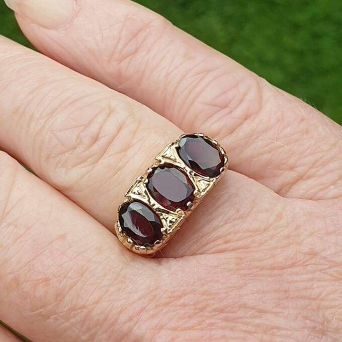 Three Stone Garnet Ring in 9ct Gold.