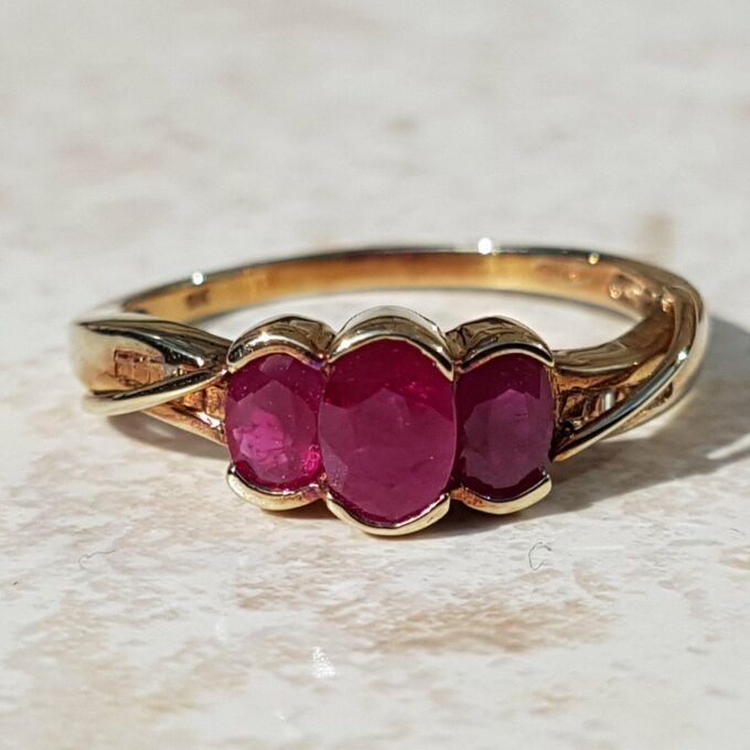 Ravishing Synthetic Ruby Three Stone Trilogy 9ct Gold Ring