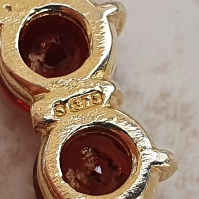 Garnet Twelve Stone Circular Brooch in 9ct Gold