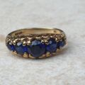 Vibrant Blue Five Stone Synthetic Sapphire Ring in 9ct Gold, a UK N or a US 7.