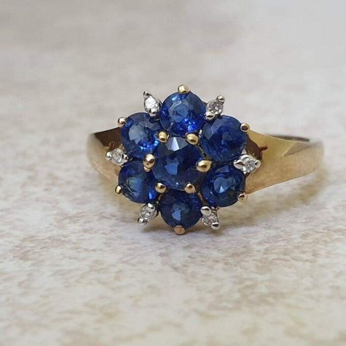 Tanzanite And Diamond Cluster Ring in 9ct Gold,  a UK J 1/2 or a US 5 1/4.
