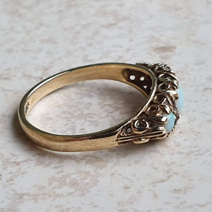 Opal and Garnet Ring in 9ct Gold, a UK N or a US 7