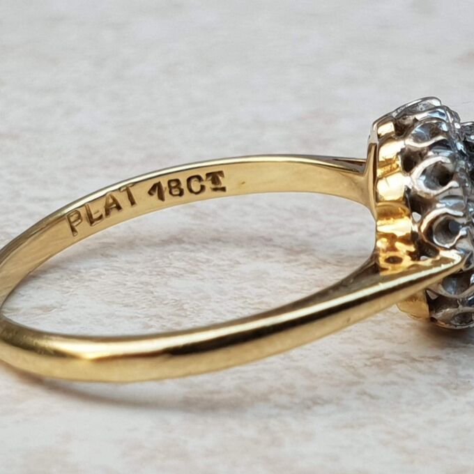 Sapphire and Diamond Halo ring in 18ct Gold and Platinum, a UK M or a US 6 1/2.