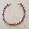 Amethyst Tennis Bracelet in 9ct Gold,  7 1/4 inches in length.