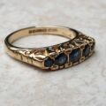 Blue Sapphire Five Stone Ring in 9ct Yellow Gold, a UK K 1/2 or a US 5 3/4.