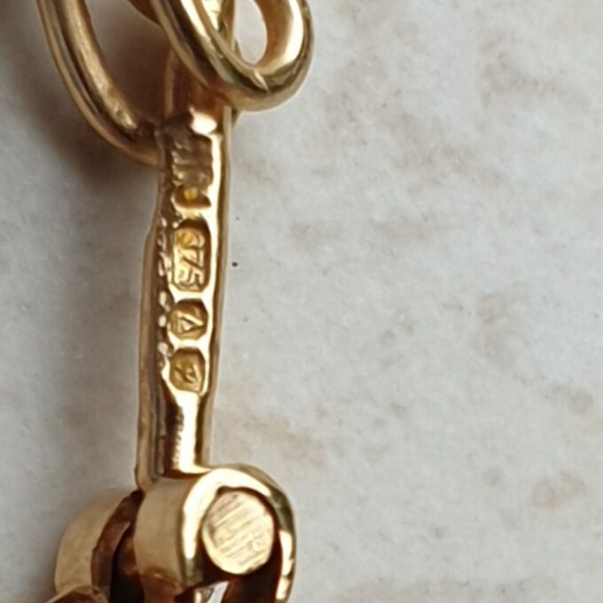 Twisted Rope Effect Hoop Earrings in 9ct Gold by Unoaerre.