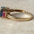 Topaz and Synthetic Ruby Trilogy Ring in 9ct Gold.