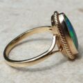 Oval Opal Doublet Ring in 9ct gold, a UK O or a US 7 1/2