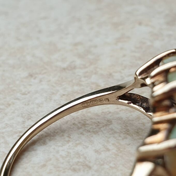 Seven Stone Opal Cluster Ring in 9ct Gold, a UK M 1/2 – N or a US 6 3/4