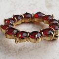 Garnet Twelve Stone Circular Brooch in 9ct Gold