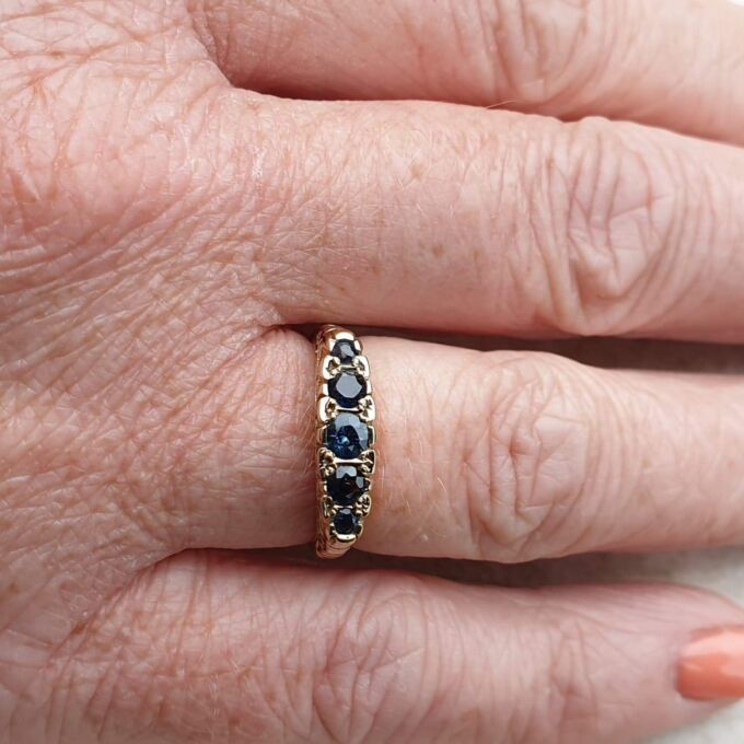 Blue Sapphire Five Stone Ring in 9ct Yellow Gold, a UK K 1/2 or a US 5 3/4.