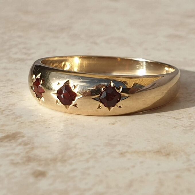 Three Stone Garnet Ring in 9ct Gold,  a UK O or a US 7 1/2.