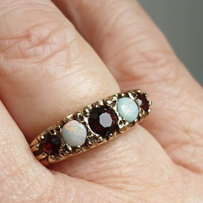 Five Stone Opal and Garnet 9ct Gold Ring, a UK K 1/2 or a US size 5 3/4.