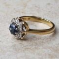 Sapphire and Diamond Daisy Ring in 18ct Gold,  a UK J or a US 5.