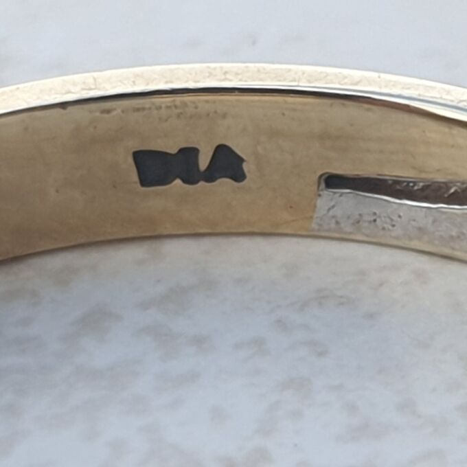 Diamond Set Wave Ring in 9ct Gold.