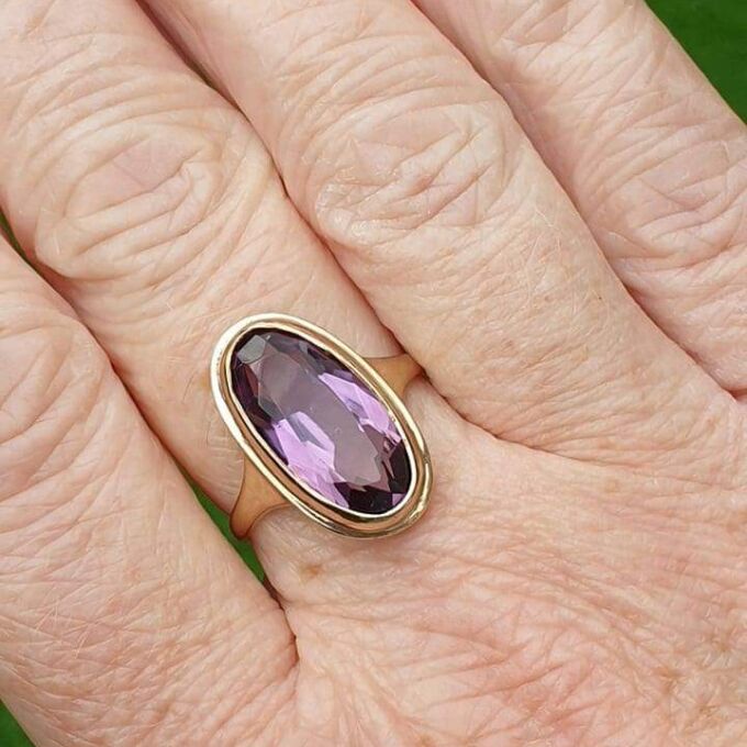 Elongated Oval Amethyst Solitaire Ring in 9ct gold.