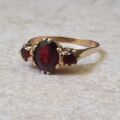 Garnet Trilogy Ring in 9ct Gold.
