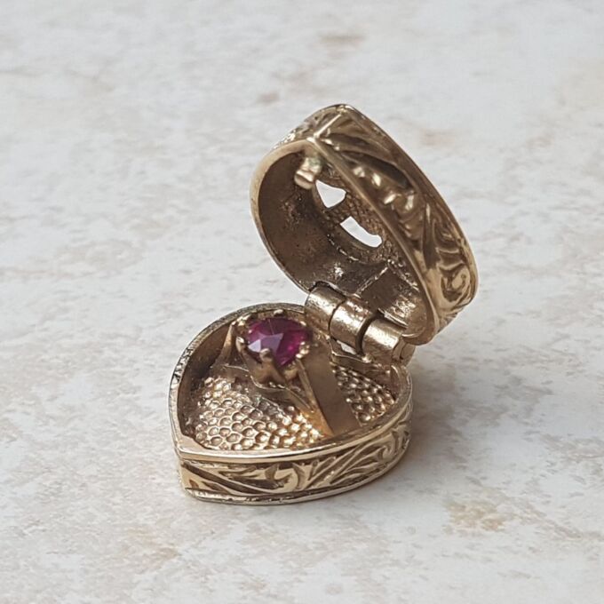 Truly Fabulous Heart Locket Secret Ruby Ring in 9ct Gold