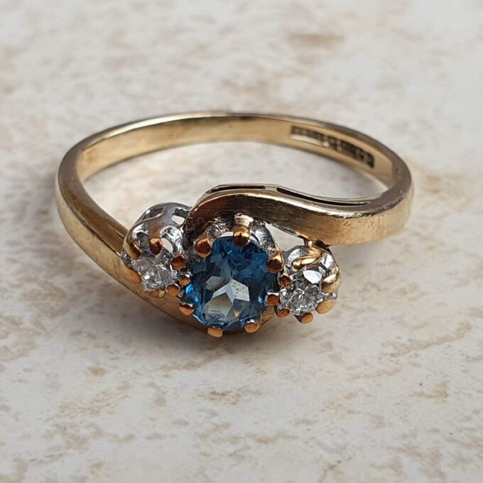 Topaz & Diamond Crossover Trilogy Ring in 9ct Gold.
