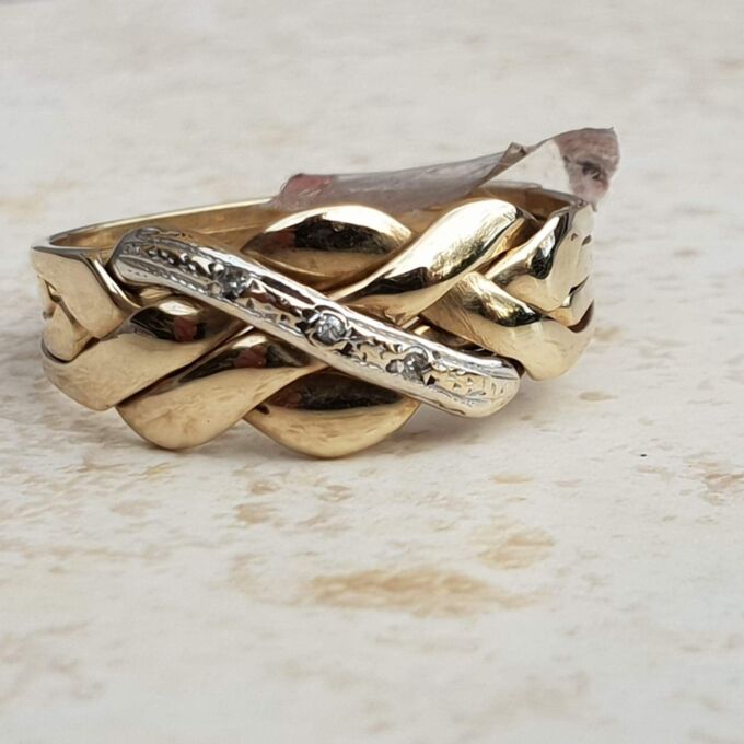 Four Piece Puzzle Ring with Diamond Accents in 9ct Gold, a UK P or a US 8.
