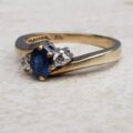 Sapphire and Diamond Trilogy Bypass Ring in 9ct Gold, a UK I 1/2 or a US 4 3/4.