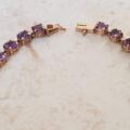 Amethyst Tennis Bracelet in 9ct Gold,  7 1/4 inches in length.