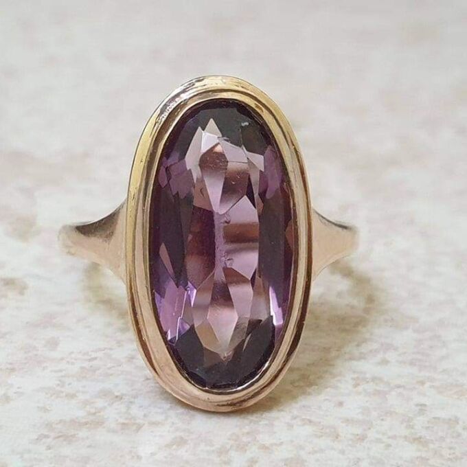 Elongated Oval Amethyst Solitaire Ring in 9ct gold.