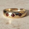 Three Stone Garnet Ring in 9ct Gold,  a UK O or a US 7 1/2.