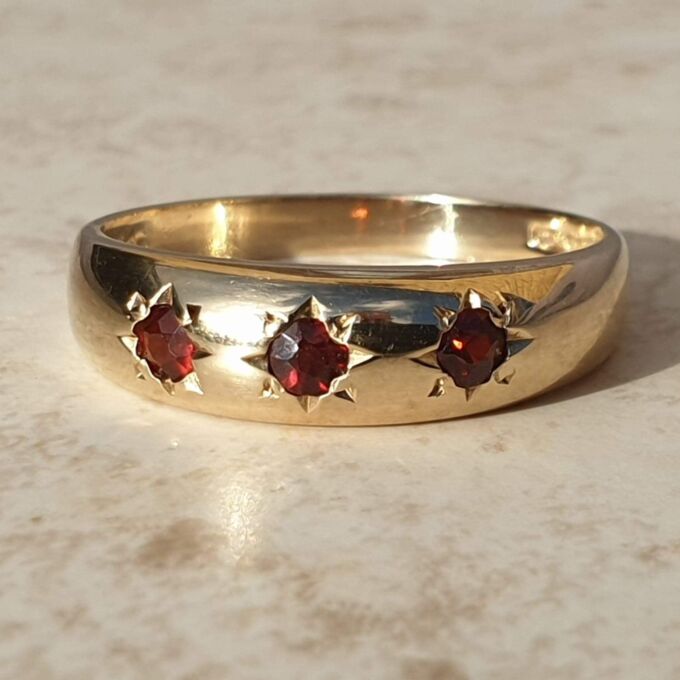 Three Stone Garnet Ring in 9ct Gold,  a UK O or a US 7 1/2.