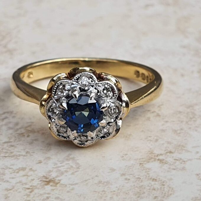 Sapphire and Diamond Daisy Ring in 18ct Gold,  a UK J or a US 5.