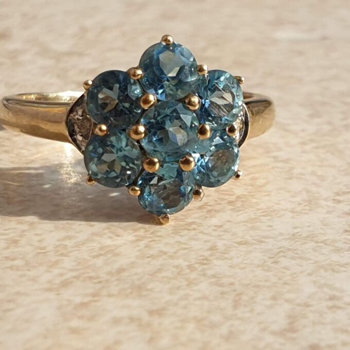 Topaz Flower Cluster Ring in 9ct Gold,  a UK O 1/2 or a US 7 3/4.
