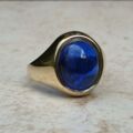 Synthetic Sapphire Cabochon Signet Ring in 9ct Gold, a UK P 1/2 or a US 8.