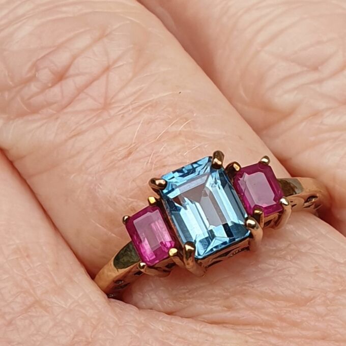 Topaz and Synthetic Ruby Trilogy Ring in 9ct Gold.