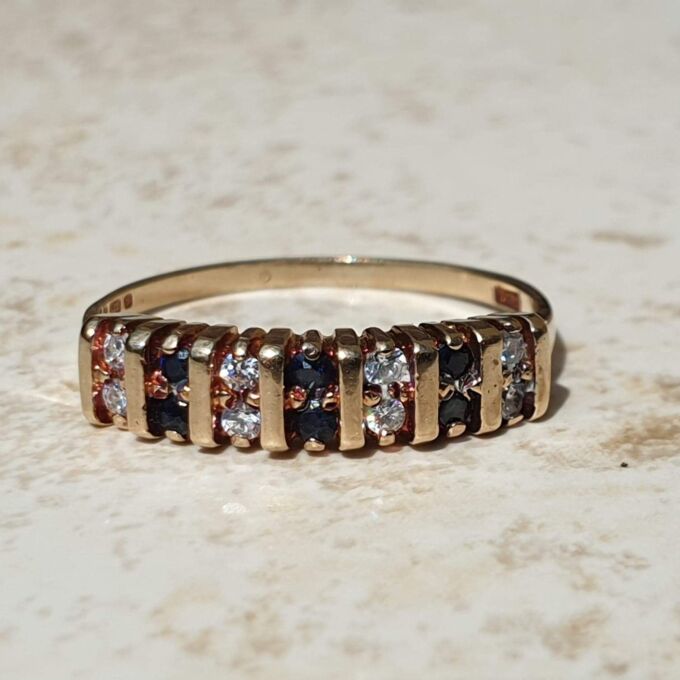 Sapphire and Paste Duo Stone Band in 9ct Gold,  a UK N or a US 7.