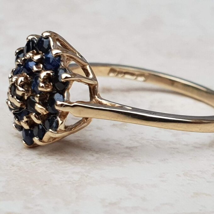 Synthetic Sapphire Cluster Ring in 9ct Gold, a UK M 1/2 or a US 6 3/4.