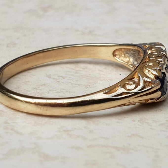 Three Stone Sapphire Ring with Diamonds in 9ct Gold, a UK O 1/2 or a US 7 1/2.