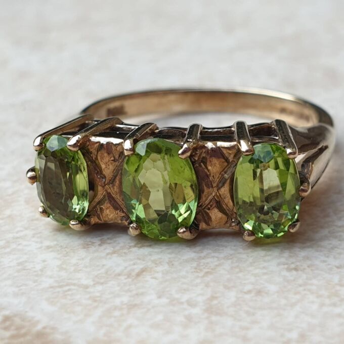 Peridot Three Stone Ring in 9ct Gold.