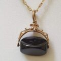 Onyx Spinner Fob Pendant in 9ct Gold.
