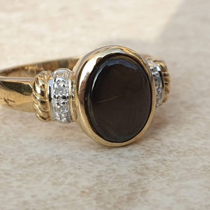 Black Synthetic Star Sapphire Ring in 9ct Gold.