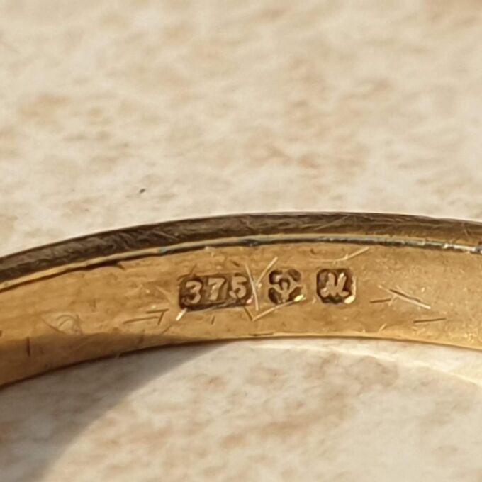 Diamond Set Torque Ring in 9ct Gold,  a UK M 1/2 or a US 6 3/4.